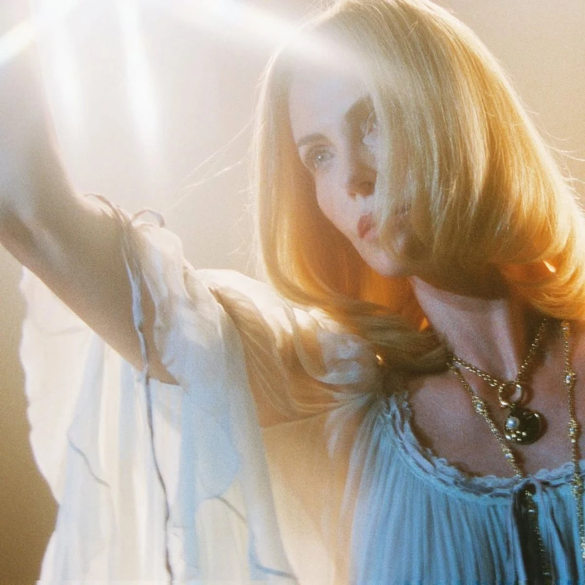 Charlize Theron Channels ‘70s Vibes in See-Through Dress for Perfect Magazine