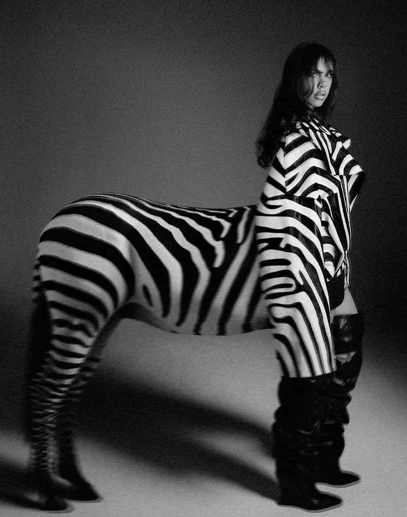 Alysha wearing zebra-striped coat in Animal Instinct editorial