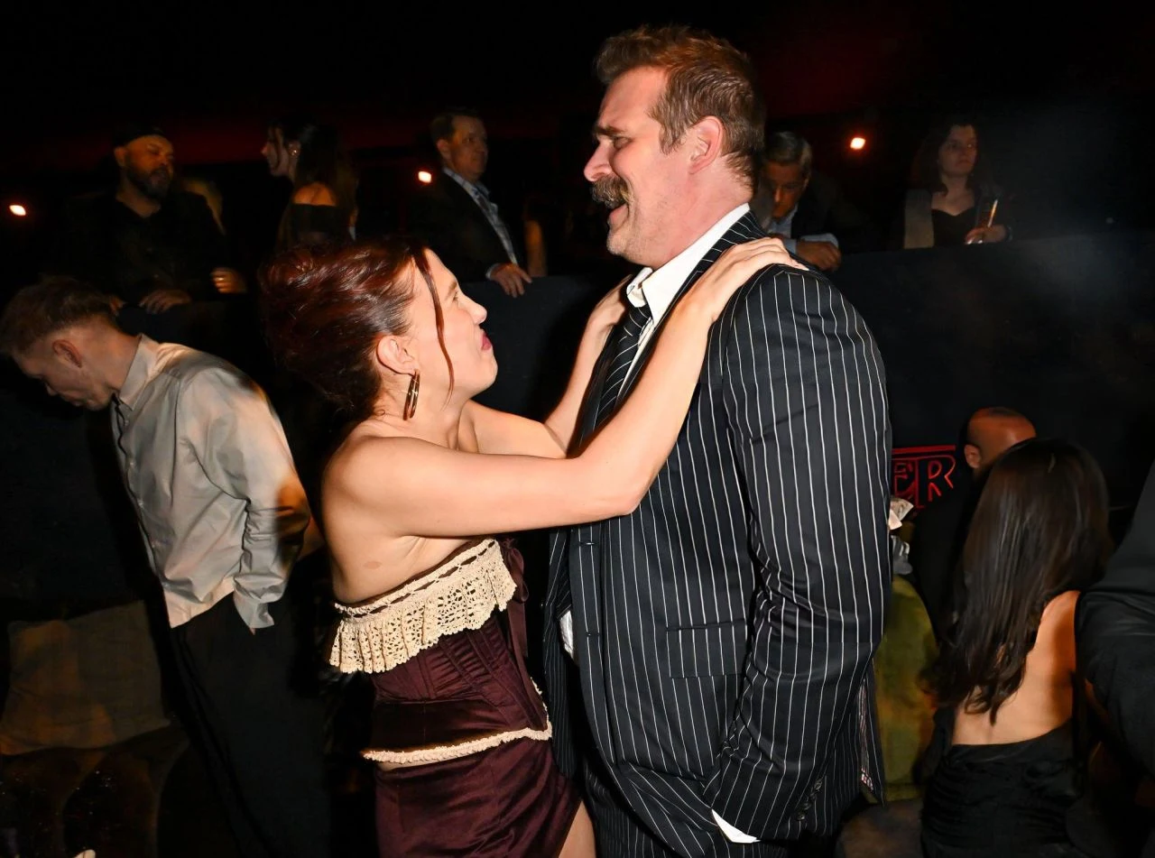 Millie Bobby Brown in Burgundy Lace Dress at Stranger Things LA After Party