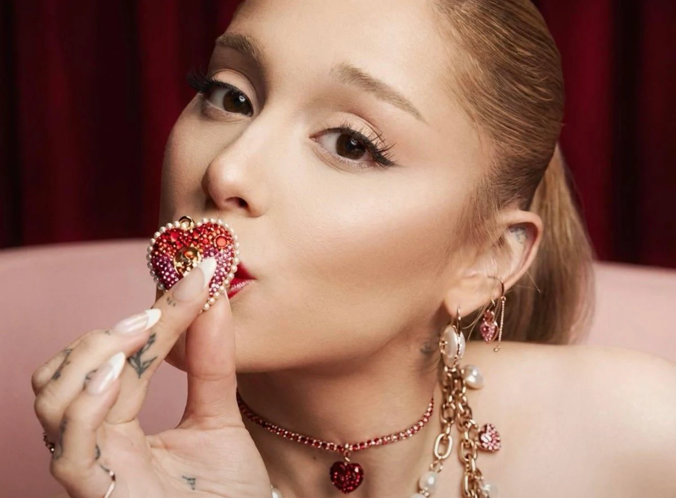 Ariana Grande models heart-themed Swarovski jewelry for Valentine’s Day 2026