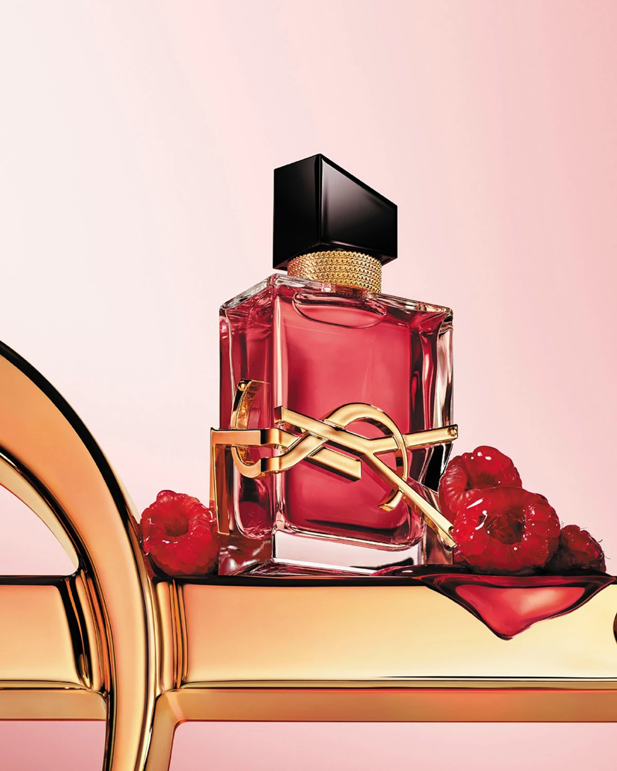 YSL Beauty Libre Berry Crush perfume bottle with gold Cassandre logo