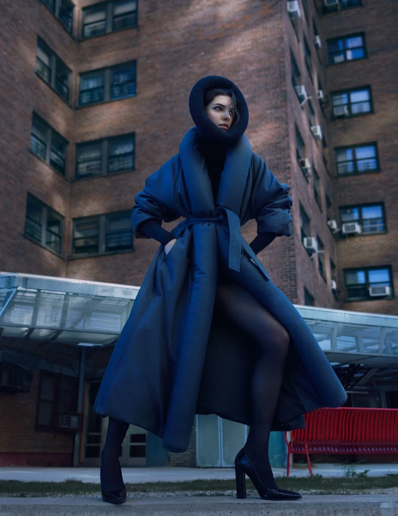 Carla Rey posing in oversized outerwear for Vogue Czechoslovakia in New York