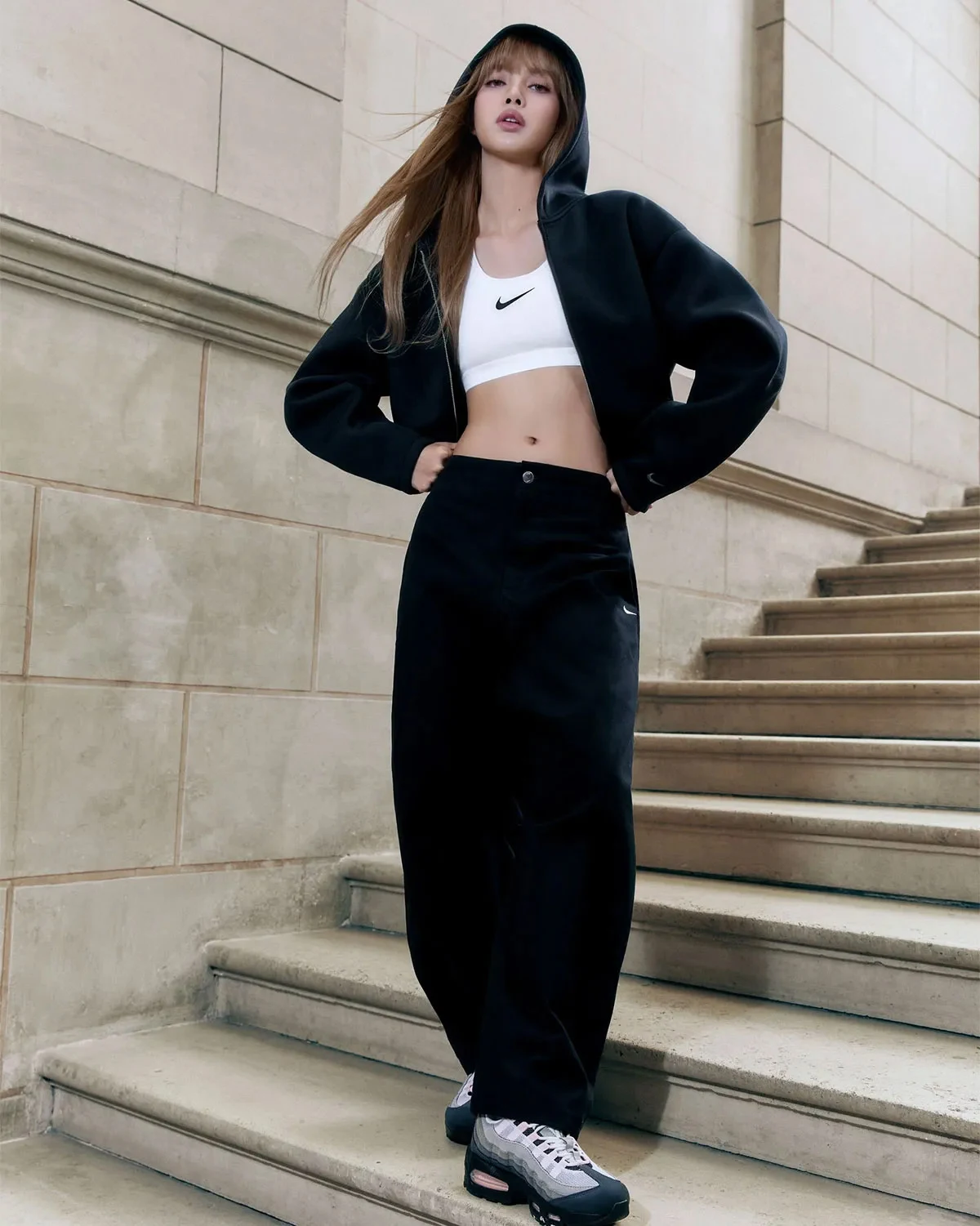 LISA wearing Nike Air Max 95 sneakers in Paris