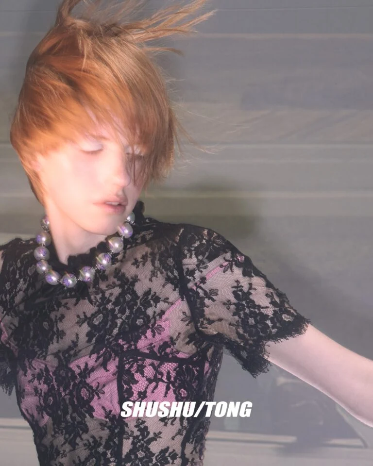 Model wearing black lace dress in SHUSHU/TONG Spring Summer 2026 campaign