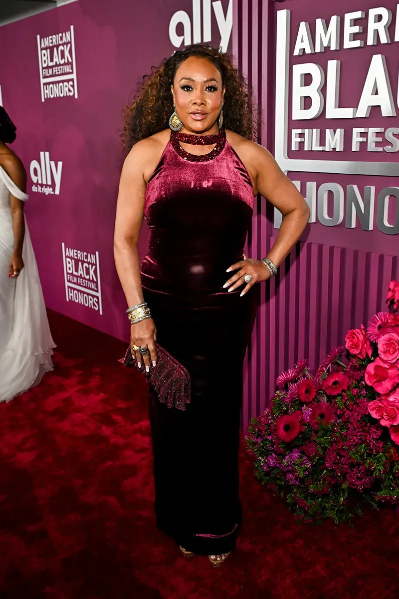 Vivica A. Fox in a sleeveless maroon velvet gown with jeweled neckline at the ABFF Honors