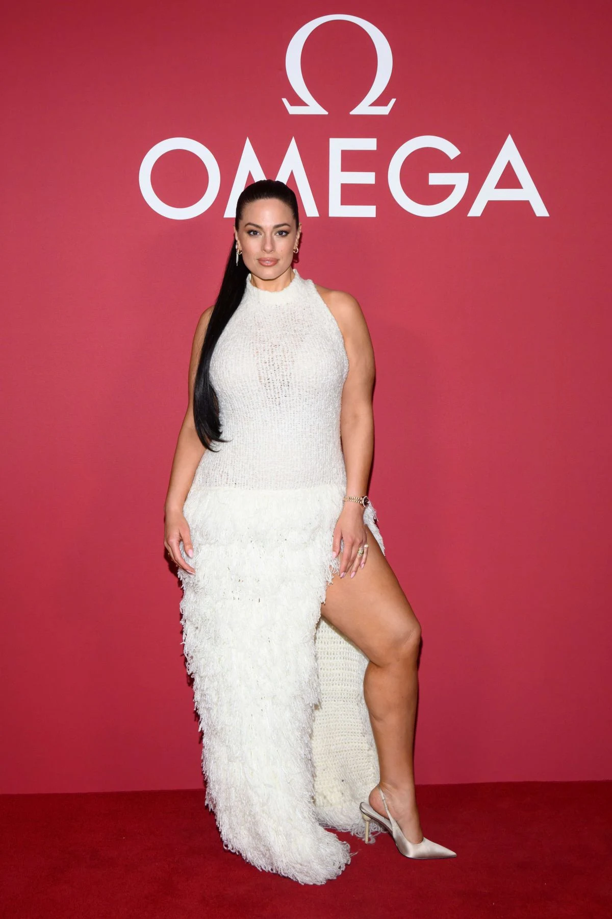 Ashley Graham thigh-high split dress Winter Olympics event