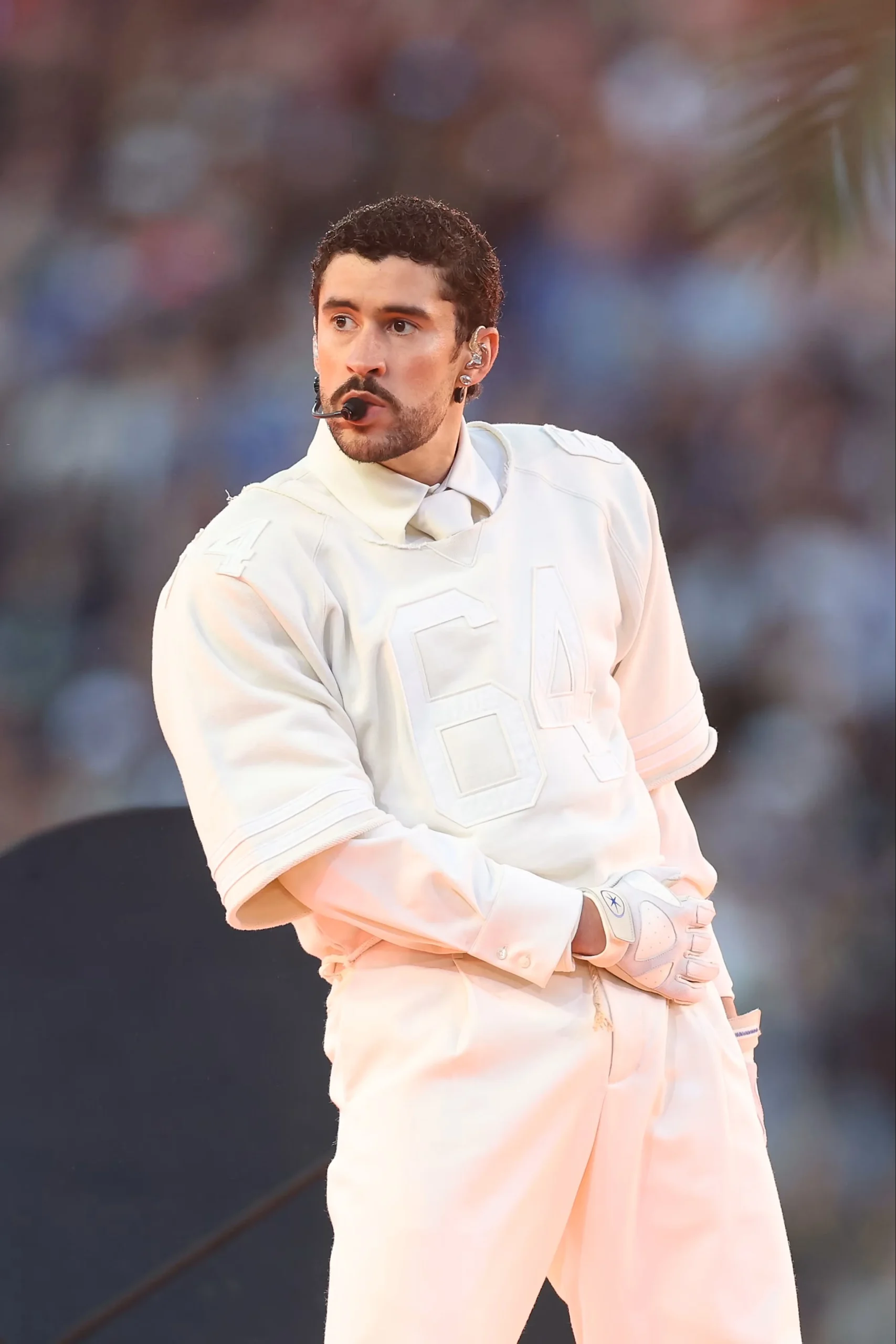 Bad Bunny white jersey number 64 honoring family