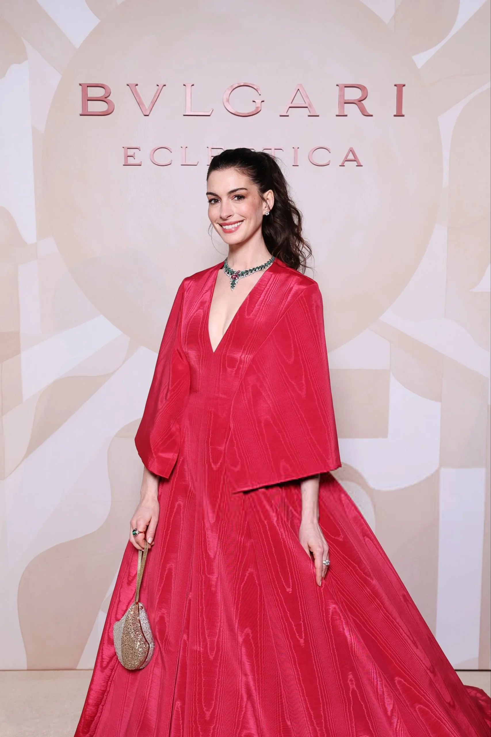 Anne Hathaway Wore a Flowing Red Gown at Bvlgari Dinner