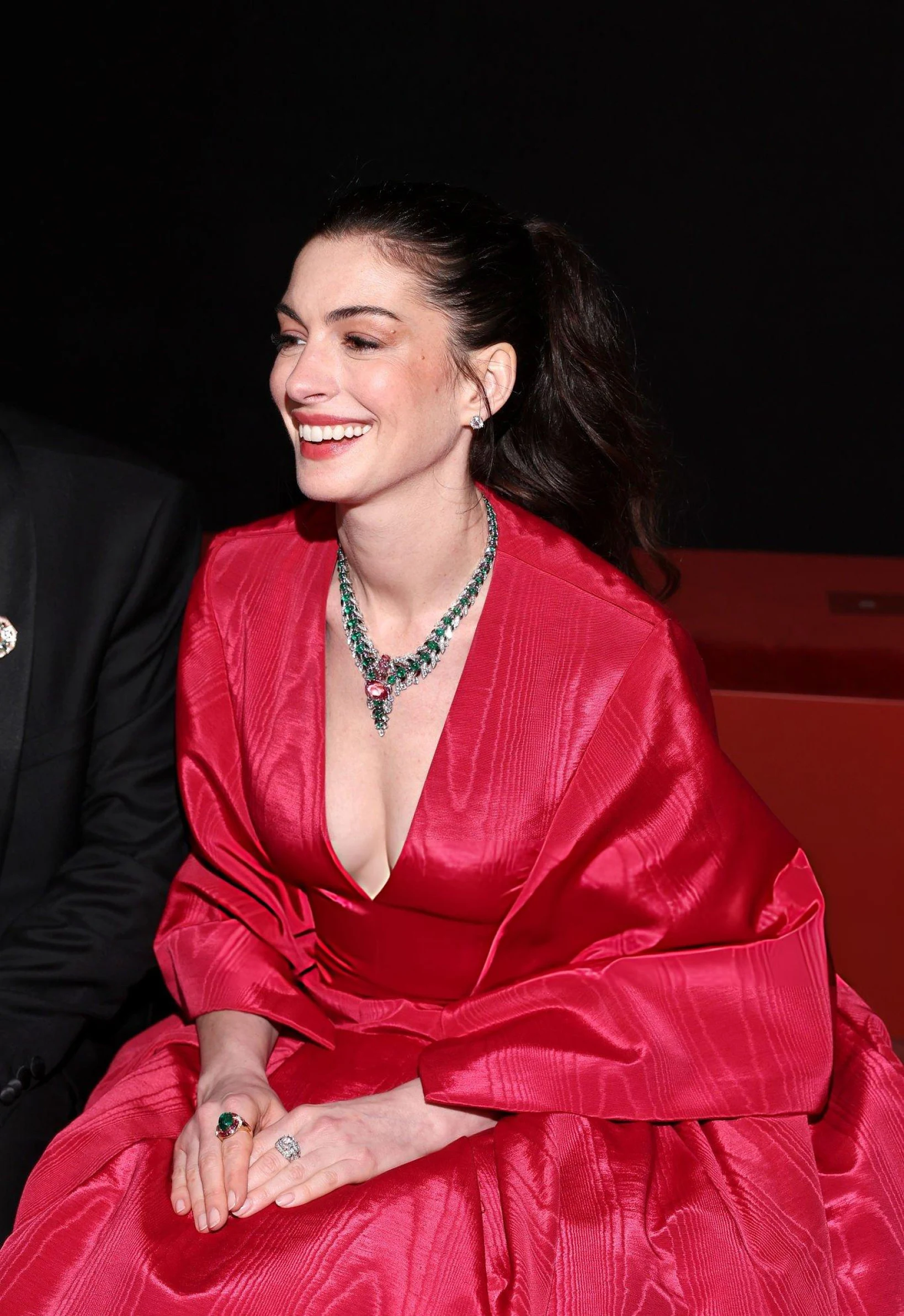 Anne Hathaway Paired a Bold Red Dress with Emerald Jewelry