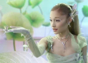 Ariana Grande Swarovski dragonfly jewelry campaign March 2026