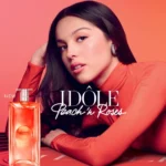 Idôle Peach ‘N Roses perfume bottle featured alongside Olivia Rodrigo in campaign image