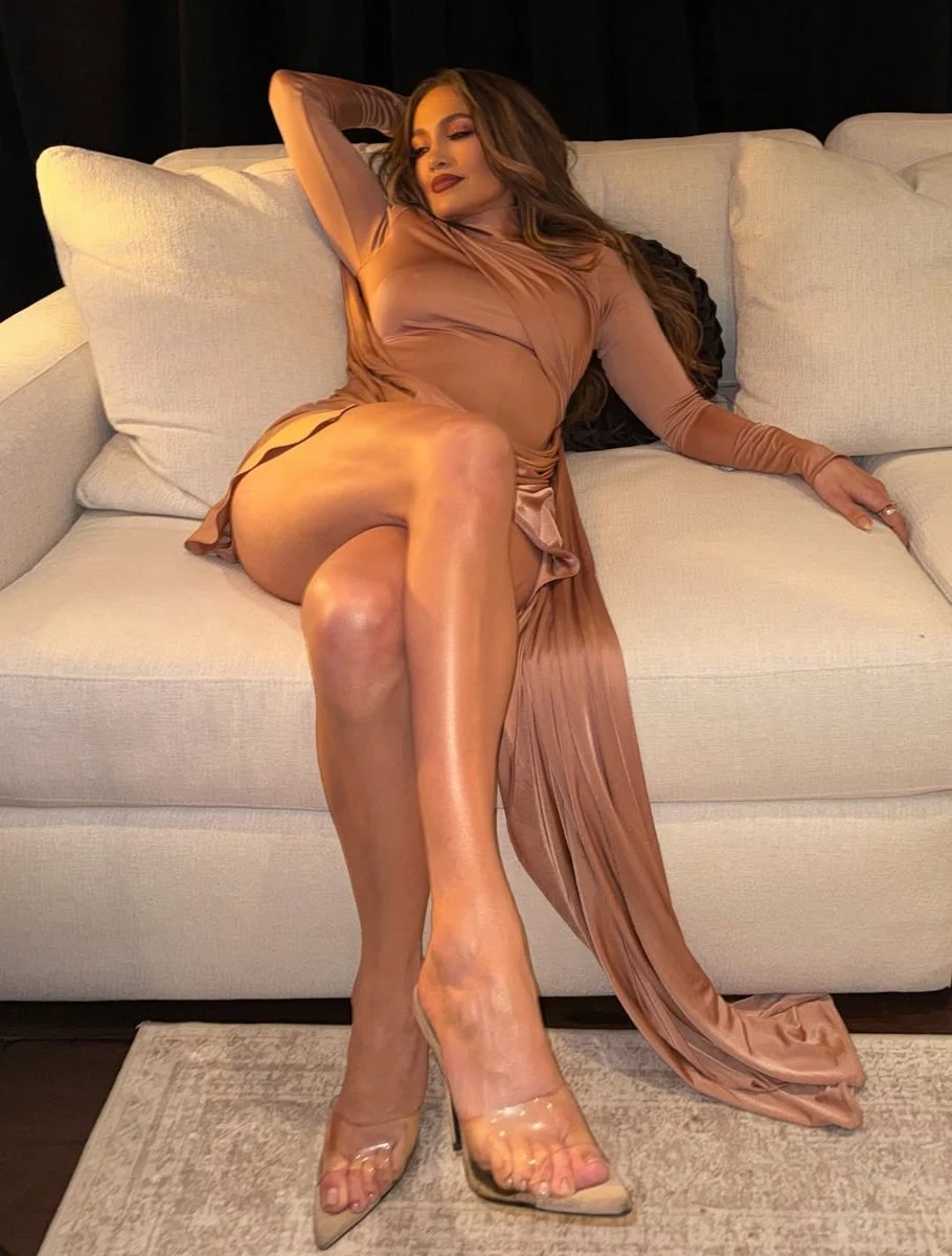 Jennifer Lopez sitting pose nude dress with train detail