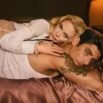 Madonna posing with Alberto Guerra in The One fragrance advertisement