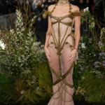 Margot Robbie wearing a sheer pink Dilara Findikoglu gown at Wuthering Heights UK premiere