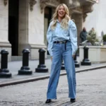 Sydney Sweeney wearing jeans and denim jacket at New York Stock Exchange