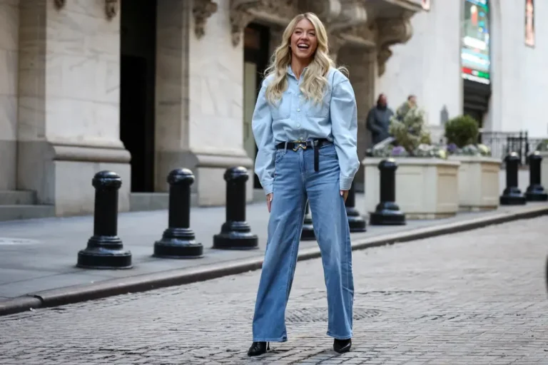 Sydney Sweeney wearing jeans and denim jacket at New York Stock Exchange